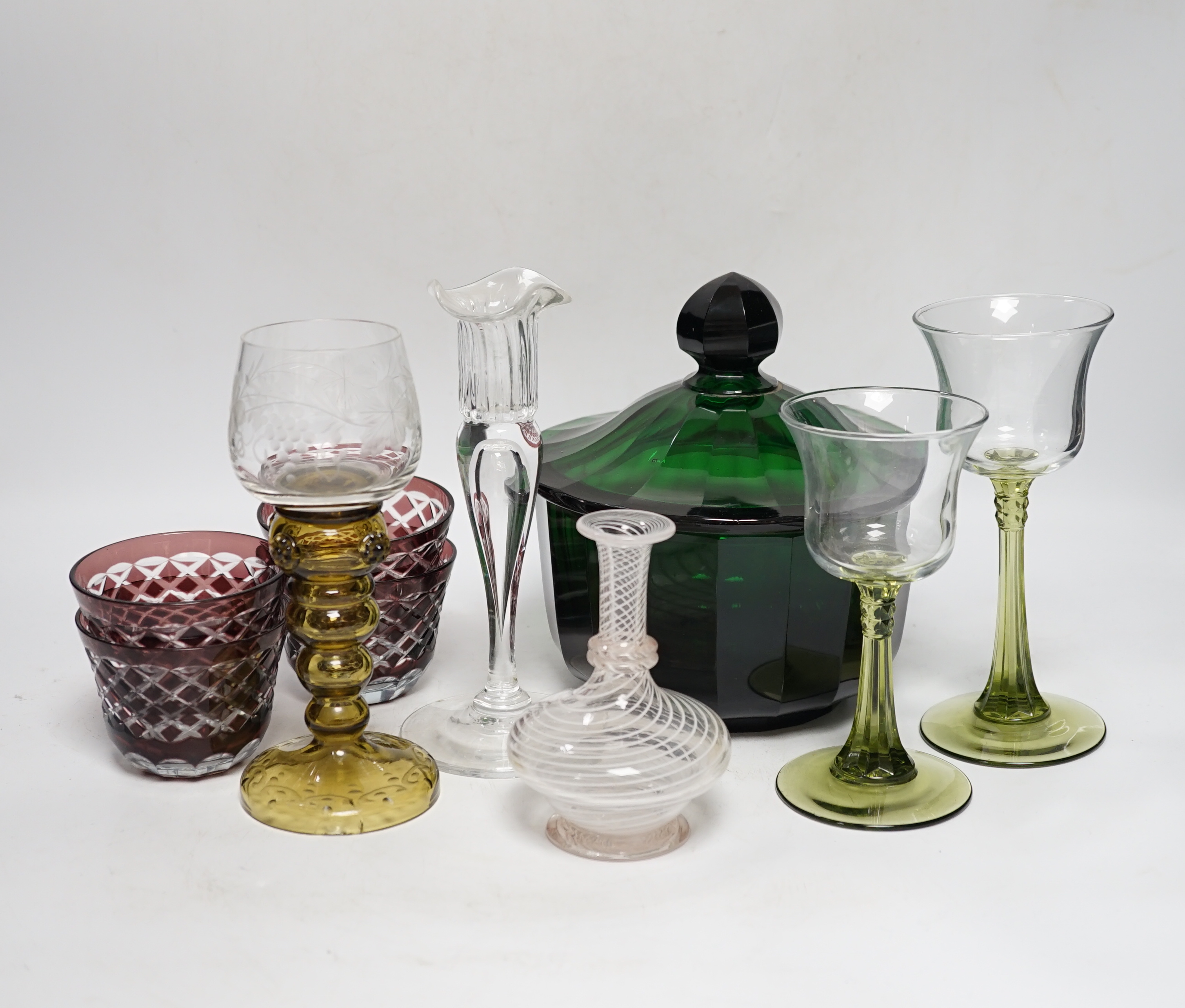 Ten cut glass etc. items, including a cut glass green lidded bowl, four cut glass cranberry bowls, three wine glasses, etc. tallest 19.5cm
